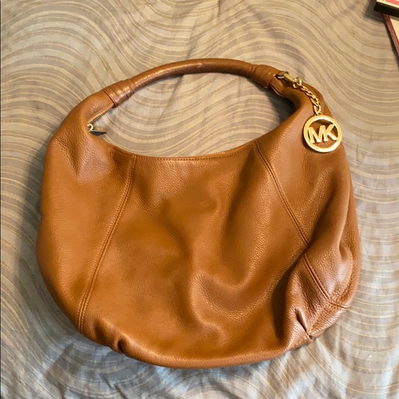 Michael Kors Handbags - Michael Kors luggage color hobo bag a gold accents